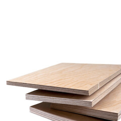 Stack of smooth plywood sheets arranged neatly for construction or craft projects in a workspace