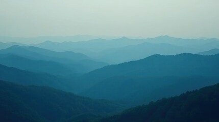 Fototapeta premium Serene blue mountain range landscape.