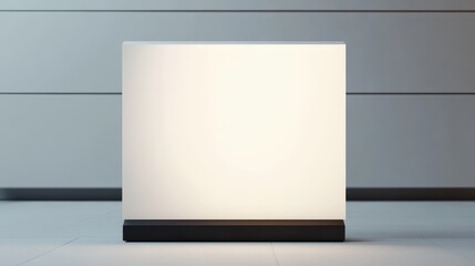 Blank exhibit sign placed prominently in a minimalist gallery space