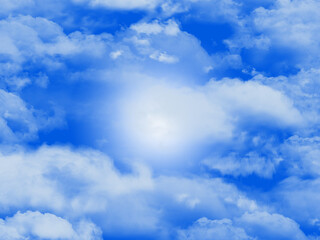 Bright blue sky adorned with fluffy white clouds, a creative backdrop.