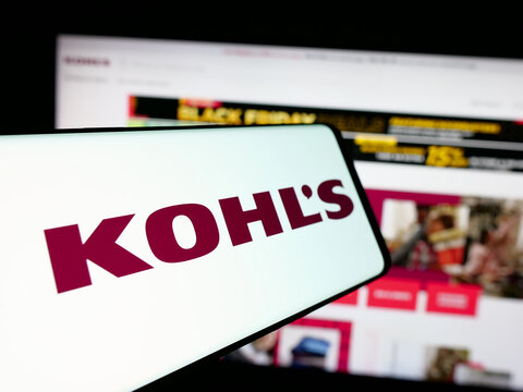 Stuttgart, Germany - 11-28-2024: Smartphone with logo of American department store company Kohl's Corporation on screen in front of website. Focus on center of phone display.