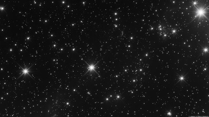 Obraz premium Dark night sky filled with countless twinkling stars of varying brightness and sizes.