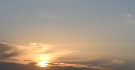 Sunrise yellow golden orange blue sky with cloud. Summer sunset nature landscape. Beautiful sunrise background. 