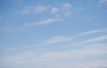 Sky background with clouds. White clouds against a blue sky.