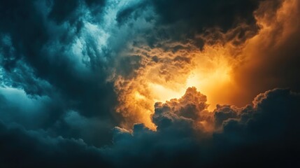 Fototapeta premium Dramatic clouds illuminated by a warm glow, creating a striking contrast in the sky.