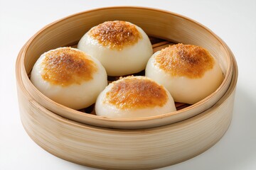 Delicious Steamed Dumplings with a Golden Browned Top Displayed Perfectly in a Traditional Bamboo Steamer for Culinary Photography Inspiration