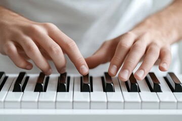 Fototapeta premium Beautifully captured hands playing the keys of a piano, conveying the emotion and artistry involved in music, inviting viewers into a world of melody and harmony.