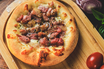 Esfiha or mini bacon pizza