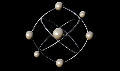 Metallic structure; orbiting spheres; dark background.