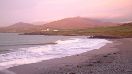 Serene Coastal Landscape at Dusk with Gentle Waves and Majestic Mountains in the Background Capturing the Beauty of Nature and Tranquility