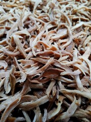 close up photo of dried mango slices, sourness from young mango fruit 