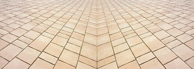 Obraz premium New paving made with stone blocks of rectangular shape in a pedestrian zone
