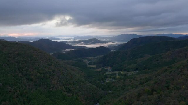 Distant foggy mountain landscape of Fukuchiyama in Rural Kyoto, Japan
