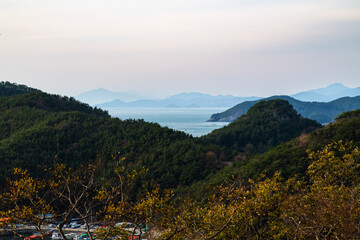 tranquil seascape of sea and islands during sunset