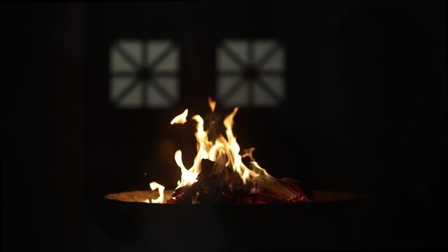 Sacred Eternal Flame in Zoroastrian Fire Temple. Atash Behram at the Fire Temple of Yazd in Iran, Established 1934. Dance of fire symbolizes sacred traditions, and struggle between light and darkness.