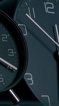 This is a closeup image of a modern clock clearly displaying the time in a stylish manner