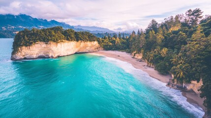 Secluded Coastal Cove with Turquoise Waters and Lush Greenery