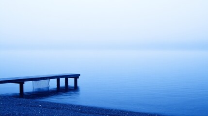 Serene Misty Morning at a Lake with a Wooden Dock