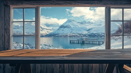 Fototapeta premium Wooden table with free space for your product or promotional text. Open window with snowfall. Landscape of winter forest mountains and small dock at the end of the village.