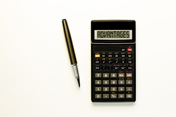 Advantages symbol. Concept word Advantages on beautiful black calculator. Beautiful white paper background. Beautiful black pen. Business advantages concept. Copy space.