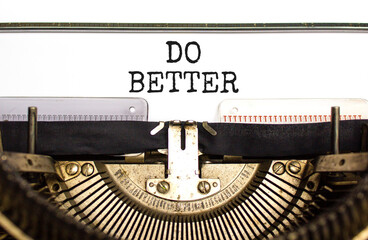 Do better symbol. Concept words Do better typed on beautiful old retro vintage typewriter. Beautiful white paper background. Business and do better concept. Copy space.