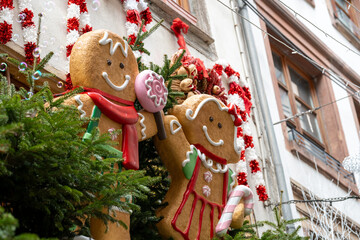 Gingerbread Christmas decoration on a tree with lights in Strasbourg France
