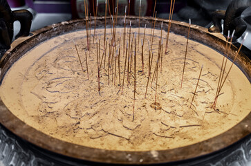 Scented incense sticks in a Buddhist temple in Singapore