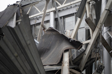 Destroyed building. Demolition of the building. Collapsed roof.