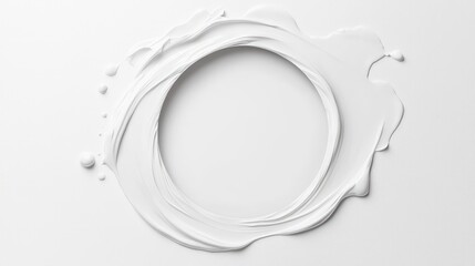 White liquid forming a circular frame on white background.