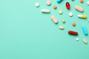 Various pills on a colored background