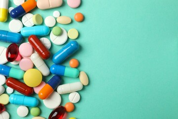 Various pills on a colored background