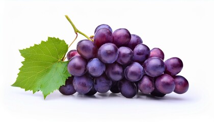 Fototapeta premium A bunch of ripe, dark purple grapes with a vibrant green leaf.