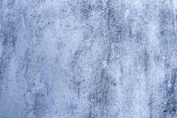 Blue Concrete Texture: A close-up shot of a blue concrete wall with interesting textures and imperfections, showcasing the raw beauty of industrial materials.  Perfect for backgrounds.