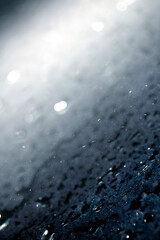 Close Up of Heavy Rain Floating Liquid Water Bubbles and Drips Black Background