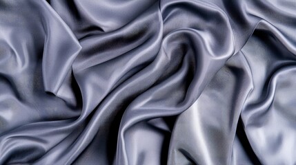 Obraz premium Draped gray silk fabric texture background.