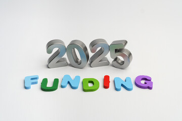 2025 funding concept alphabet 3D colorful text on white background
