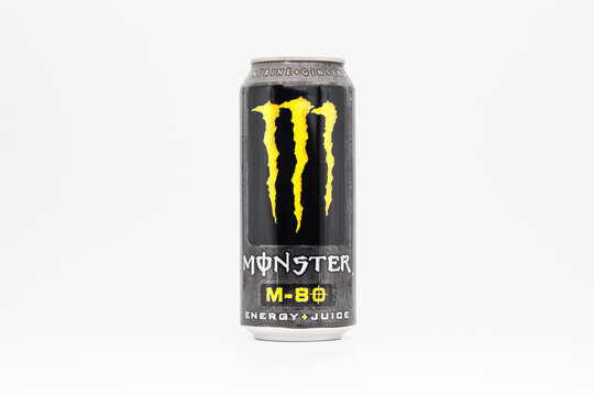 DRESDEN, GERMANY - 20. December 2024: Monster M-80 Energy + Juice beverage from 2012. The can is yellow colored with the iconic claw. The drink tastes like a mix of tropical fruit juices.