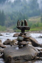 Unusual figurine made of river pebbles.