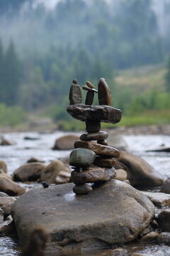 Unusual figurine made of river pebbles.