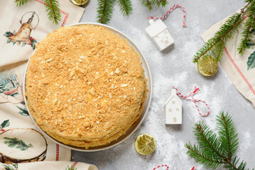 Napoleon cake  on a Christmas rustic background