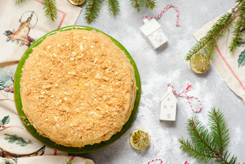 Napoleon cake  on a Christmas rustic background