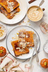 Pumpkin French Toast with Maple Syrup, Almonds and Powdered Sugar