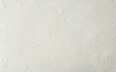 Pile of uncooked organic semolina background and texture