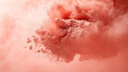 Fototapeta premium Coral Powder Exploding In A Cloud Of Dust