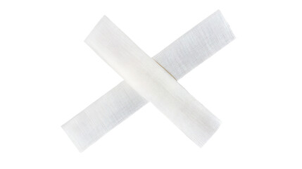 Obraz premium White Fabric Adhesive Bandage Strips Crossed X Shape