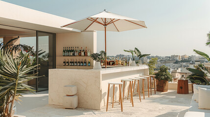 A minimal outdoor bar set with stools with composite frames in white, an umbrella overhead on a trendy rooftop terrace.
