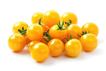 A pile of small yellow cherry tomatoes with a glossy finish, isolated on white