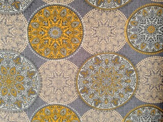 Mandala pattern over fabric closup view