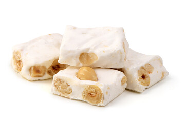 White nougat bar with hazelnuts, packaged, isolated on white background.