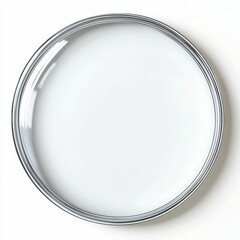 White liquid in a metallic, circular container.